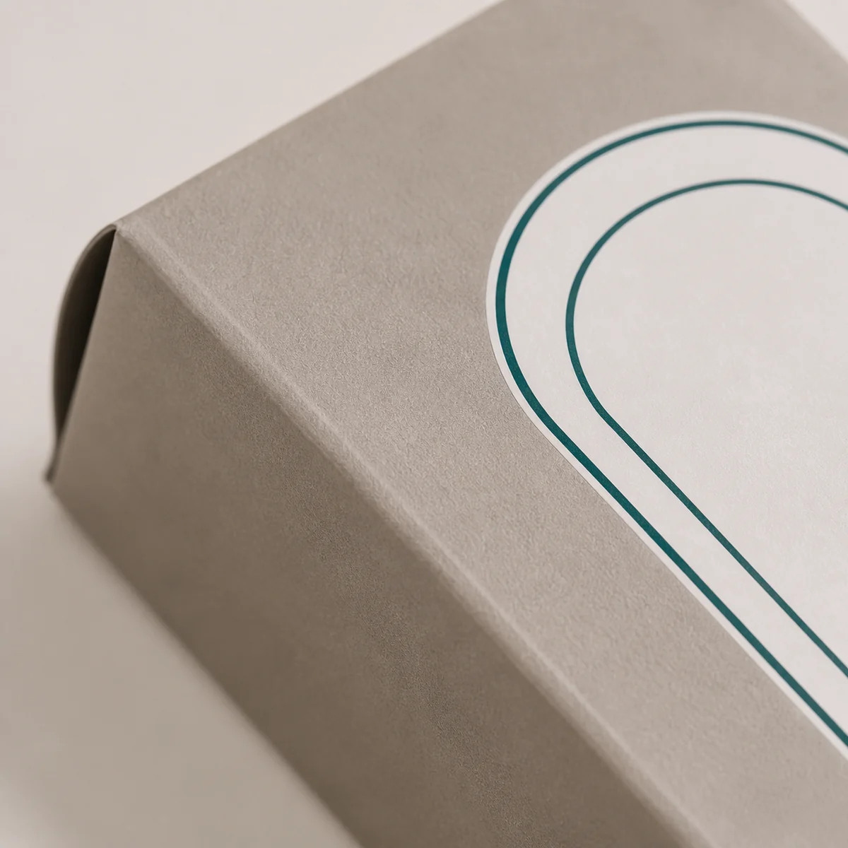 Close-up of custom eyebrow product box paper texture, print detail, and corner construction