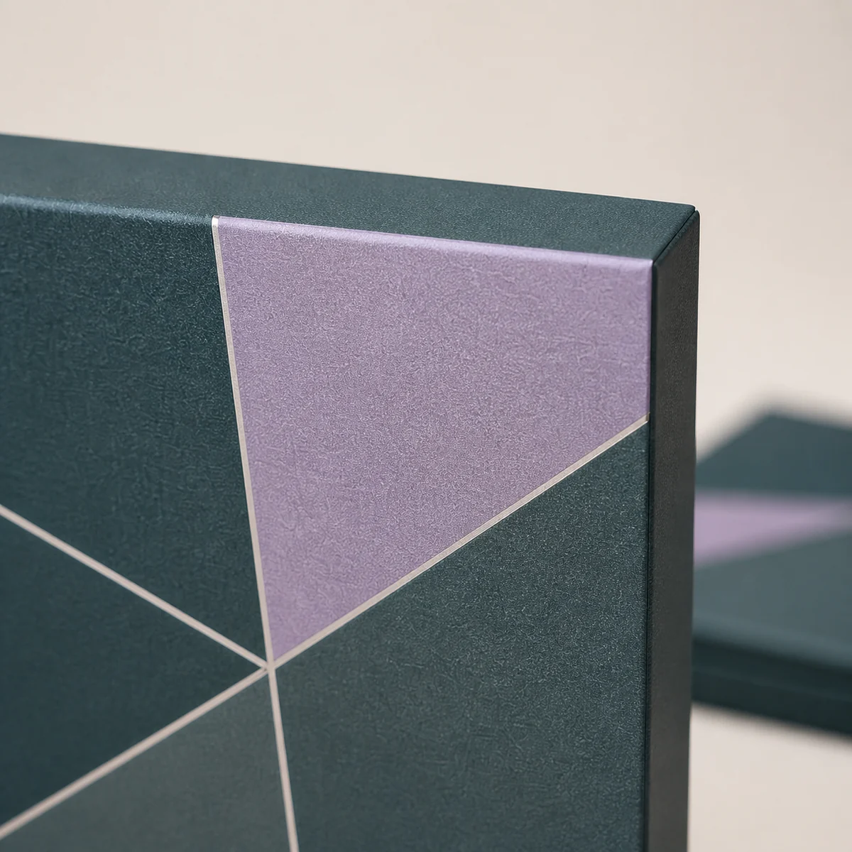 Close-up of custom eyeshadow palette box paper texture, print detail, and corner construction