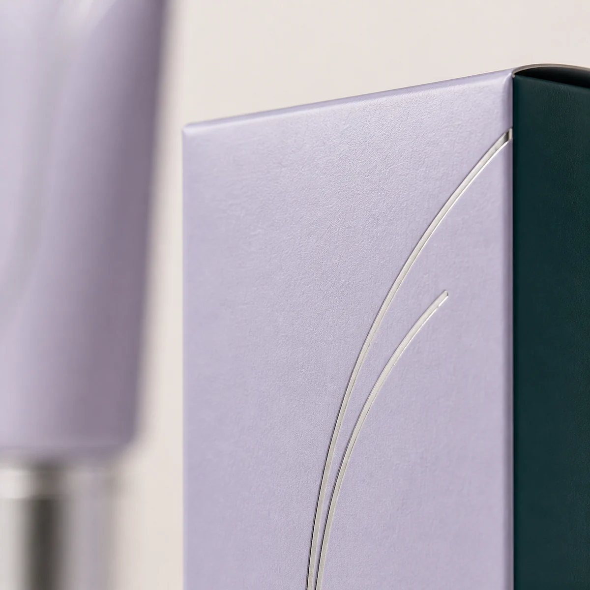 Close-up of custom primer box paper texture, print detail, and corner construction